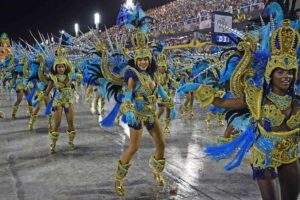 A group of women in costumes are dancing.