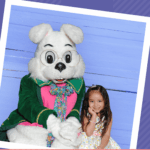 A girl posing with an easter bunny