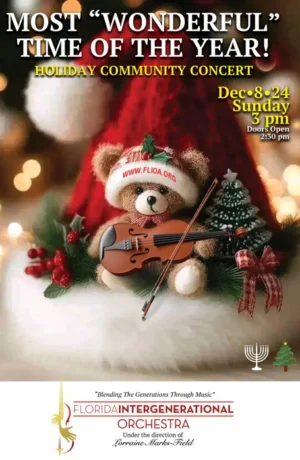 A teddy bear with a violin on top of it.